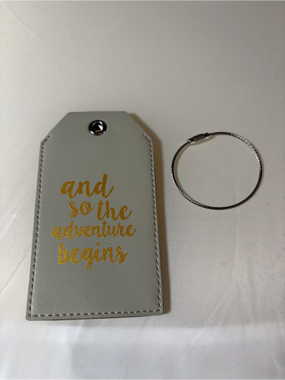 Casmonal 'And so Adventure begins' faux leather luggage tag gray